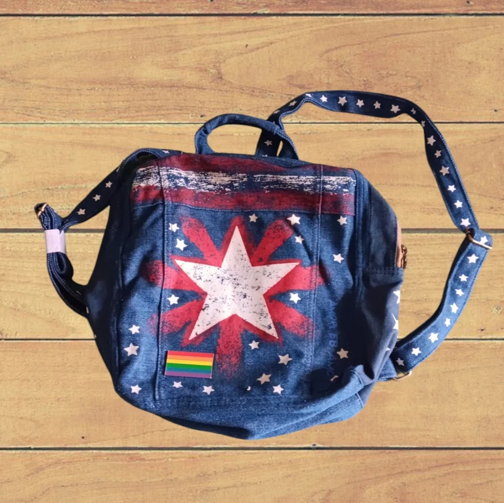 - DISNEY AMERICAN CHAVEZ MINI DENIM BACKPACK NWT
